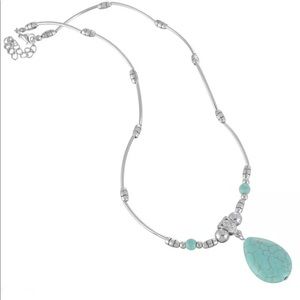 Bright silver tone oval Rimous turquoise necklace